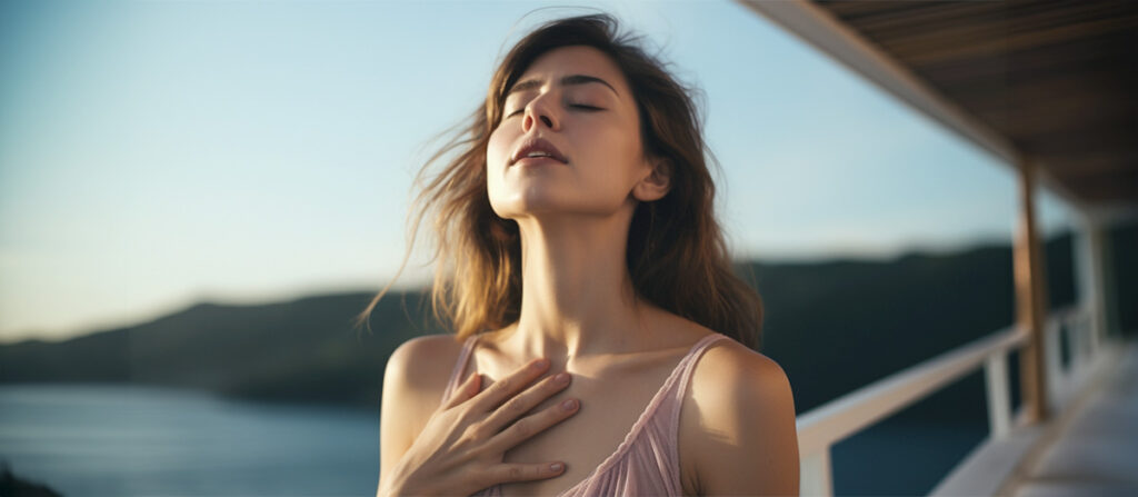 person engaging in breath work as a de-armouring practice 