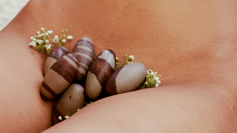 Naked woman with Shiva Lingam Yoni Egg